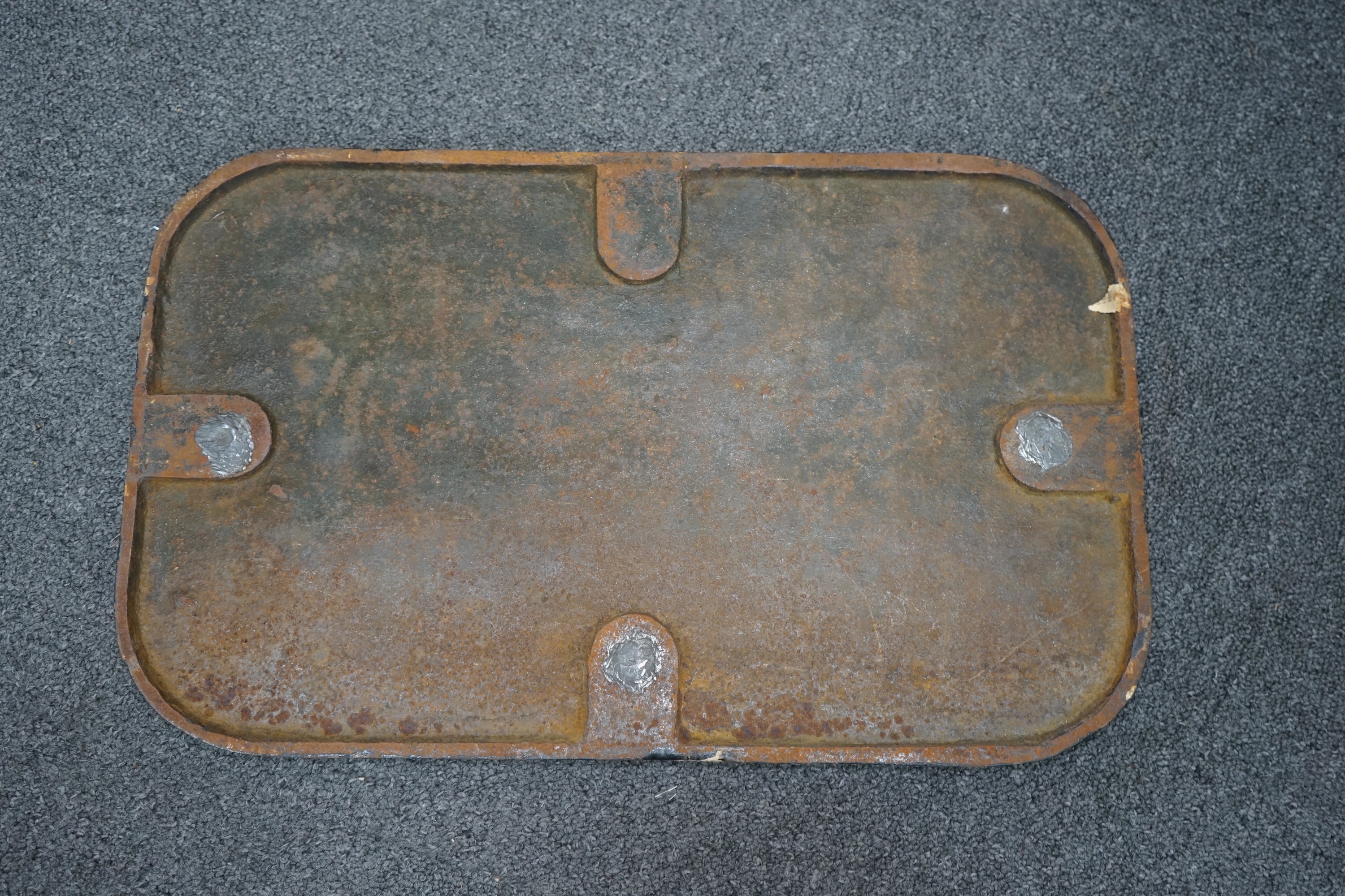 A cast iron GWR locomotive cab side number plate for a P Class 0-6-2T locomotive, 83, built in 1909 by Robert Stephenson and Company for the Rhymney Railway, dimensions; 47.5cm x 29.5cm. Condition - fair to good, general